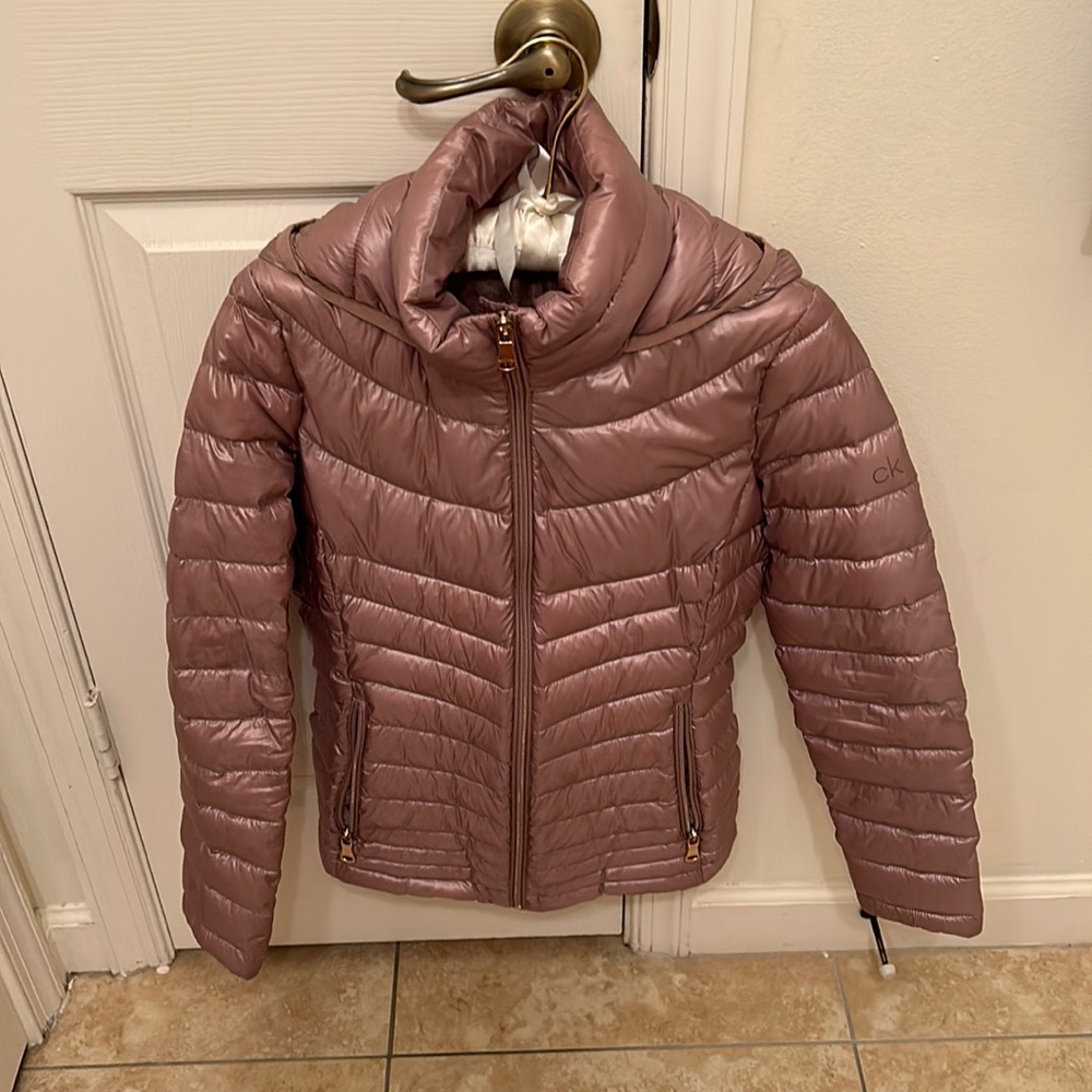 Beautiful mauve color Calvin Klein coat In excellent condition.